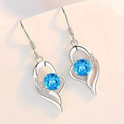 Elegant Eclipse Heart Drop Earrings with Dangle Design